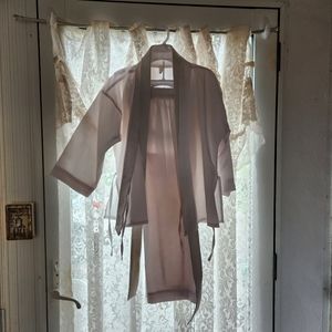 Boys size 0 karate uniform jacket with pants and belt.